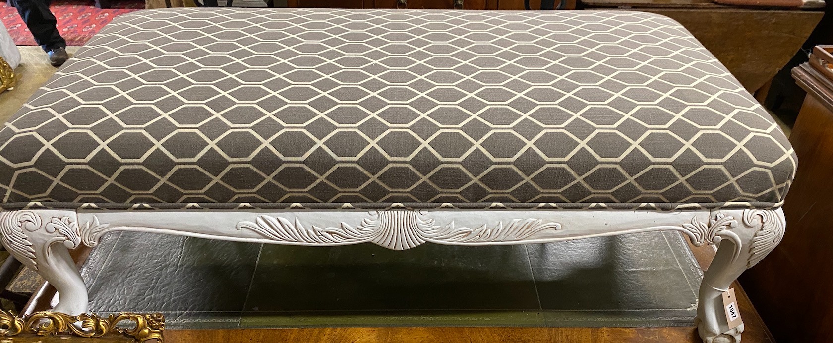 A George III style rectangular painted upholstered footstool, length 130cm, depth 65cm, height 46cm